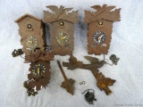 Three cuckoo clocks for parts or repair and a smaller cuckoo clock that needs a hand but Seller