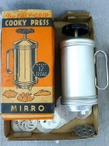 Mirro Easy-Grip Cooky Press with original box, recipes, and a variety of press plates. Press about