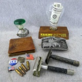Two vintage Gillette razors, four .22 cartridges marked D and U, tractor suicide knob, I Like Ike