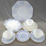 Pretty opalescent cups and saucers, dessert plates, serving platter. All pieces look to match except