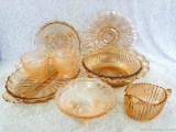 Several pink Depression glass pieces incl footed bowl, creamer and sugar, other bowls, divided dish,