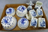 Four hand painted Delft Blue wall hangings, spice canisters made in Czechoslovakia and Germany,