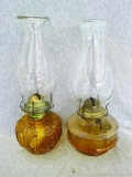 Two oil lamps in good condition, taller about 13