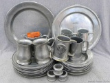 Platters, plates, tankards, napkin rings, pitcher. Larger platter is 14-1/2