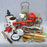 Old star and axe cookie cutters, juicer, mixer, whisks, cast iron trivets, sifter, potato masher,