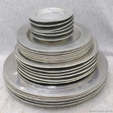 Four sizes of York Metalcrafters pewter or similar plates and dishes. Sizes ranges from 11