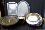 Vintage metal Bundt cake pans, pie dishes, serving platters, small wok, and more. Some dishes have
