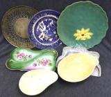 Variety of glass and metal platters and more. Various interesting designed plates would make for