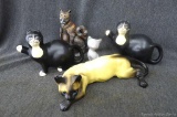 Decorative cat figurines. Good condition with no seeable cracks. Two neat figures are little