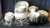 Collection of glassware. Incl. plates, cups, mugs, platters, cute ceramic serving pot. Dishes are in