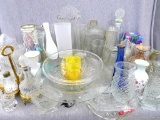 Loads of glassware, vases, pouring dishes, salt n pepper shakers, sugar bowls, and more. Pieces look