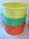 Located at alternate address in Prentice. Three retro Tupperware canisters in nice condition are