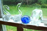 Located at alternate address in Prentice. Pretty glass art figurines. Either paper weights or