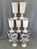 Collection of pewter goblets. Small cups measure 6 1/2'' tall, large cups measure 7 1/2''. Cups are