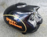 Cute Harley-Davidson piggy bank. Very nice condition, great for your spare change. Measures 6'' x
