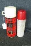 Two vintage Thermos containers. Both are usable and in good condition, largest measures 11''