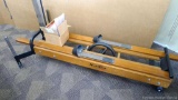 Authentic Nordic Track Ski Machine. Is in working condition, front bar raises, string pulley moves