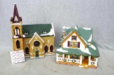 Two Department 56 Christmas village pieces. One is Mount Olivet Church, stands about 11