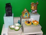 Located at alternate address in Prentice. PartyLite candle displays with original boxes including