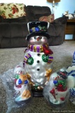 Located at alternate address in Prentice. Thomas Pacconi glass snowman figure stands 14