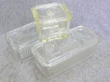 Glasbake glass refrigerator storage dish and two other refrigerator glass storage dishes. Dishes are