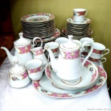 Set of Remington china, service for twelve, plus serving pieces including creamer and sugar, tea and