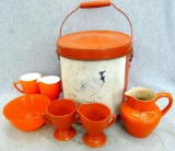 Retro orange glassware set, incl. bowl, pitcher, sugar cups, and cups. Along with neat red pail.
