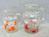 Vintage glass pitchers, with very cute retro design. Both are in good condition. Small one measures