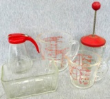Glass kitchen dishes. Incl Fire-King liquid measuring cups, sugar container, glass refrigerator