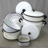Dish set of enamel ware. Incl. versatile double boiler, plates, pots, and serving dishes. Some tops