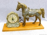Waterman decorative clock. With neat horse statue, clock is in good condition and works. Measures