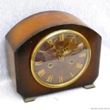 Smiths Enfield made in England key wound clock. Measures 9'' x 8'' x 4''. Comes with the key,