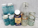 Ball blue glass jars and Atlas bail top jars. All in good condition, some ball covers has come wear.