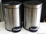 Two handy little step-style wastebaskets, each stands nearly 12