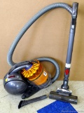 Dyson DC-39 multi-floor canister vacuum with attachments as pictured. Unit runs, looks well cared