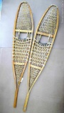 Gros Louis Snowshoes were made in Canada, 10x56. Snow shoes are in good condition overall.