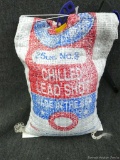 Half a bag of Lawrence Brand No. 8 chilled lead shot weighs 12 lb 8 oz.