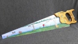 Vintage hand saw is hand painted with a river scene and measures about 30