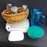 Set of three glass nesting bowls with lids, basket caddy with shaker bottles (buy to put your