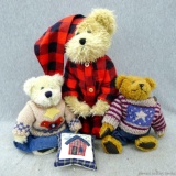 Northwoods plaid Boyd's Bear with red and black plaid kneeling bear on a stand is 14