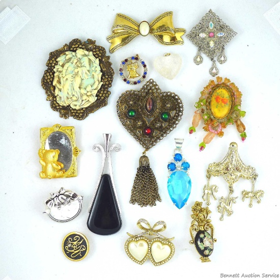 Cool assortment of brooches and necklace pendants, largest is 4" long, incl hearts, liberty bell and