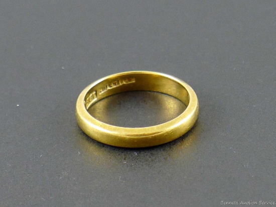 Men's wedding band or similar is marked 18K, size 7-3/4. Weighs 4.8 grams.
