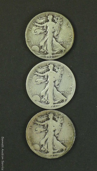 Key Date: Three 1921-S Walking Liberty silver half dollars.
