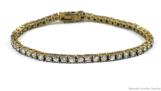 Dainty sparkling sterling silver bracelet marked 925 on clasp. Bracelet measures 7-1/2" when
