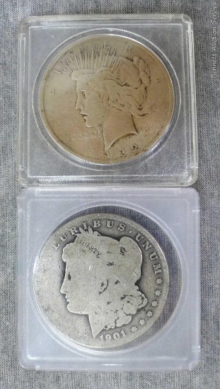 1901-O Morgan silver dollar; 1922 silver Peace dollar.