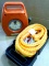 Handy tow strap set in storage case; extension cord reel with cord.
