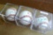 Three autographed baseballs, in cases labeled, Jerry Koosman, Ron Kittle, John Rocker.
