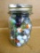 Pint jar of old glass marbles.