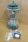 Coleman Model 220-F twin mantle white gas lantern date coded 11-65. Pyrex Coleman globe is intact.