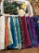 Nice assortment of sewing or quilting material in blues, greens, some oranges & reds. Box is approx.